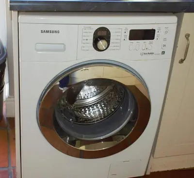 a washing machine with a bowl inside of it at Mafunyani Cottage in Franschhoek