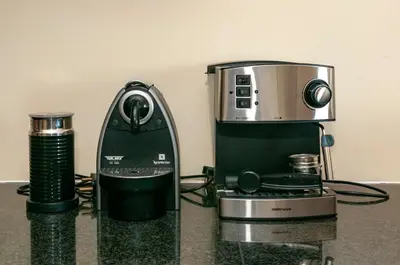 a coffee maker and a microwave on a counter at Luxury Ocean View 1203 in Cape Town