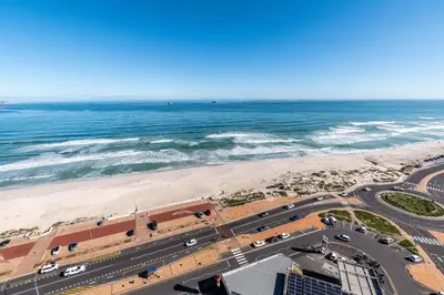 an aerial view of a beach and the ocean at Horizon Bay 1502 in Cape Town