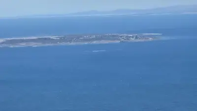 an island in the middle of a large body of water at Shore2Please in Cape Town
