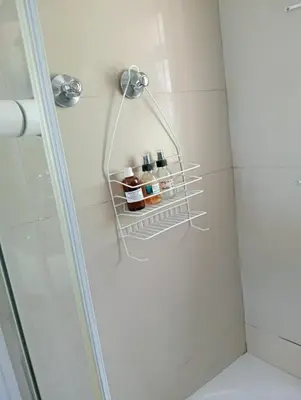 a towel rack in a shower in a bathroom at Cozy Private En Suite Studio in Cape Town