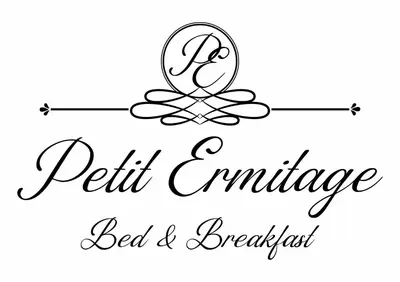 a black and white logo for a pediatricoperative bed and breakfast at Petit Ermitage in Franschhoek
