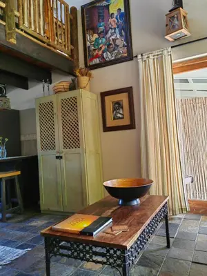 a kitchen with a table with a bowl on it at Teas & Seas Self Catering Cottage in Cape Town