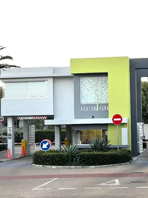 a building with a stop sign in front of it at Ashton Park 221 in Cape Town