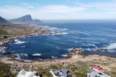 an aerial view of a beach and the ocean at Rox Villa in Rooiels