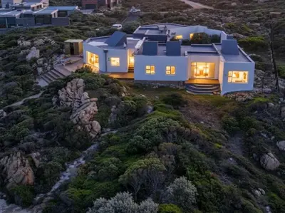 an aerial view of a house on a hill at Rox Villa in Rooiels