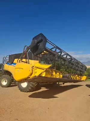 a yellow dump truck parked in the desert at Blou Porselein Guestfarm in Hermon