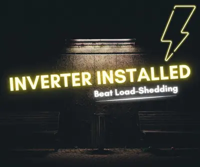a sign that reads inverter installed next to a bench at The Links by Top Destinations Rentals in Hermanus