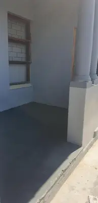 an empty room with a window on the side of a building at PEACE LODGE in Cape Town