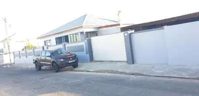 a truck parked in front of a house at PEACE LODGE in Cape Town