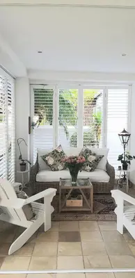 a living room with a couch and a table at Stellenbosch Paradyskloof Unit in Stellenbosch