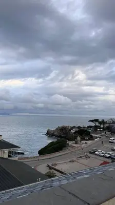 a view of the ocean on a cloudy day at Hermanus Waterfront Apartment No.19 in Hermanus