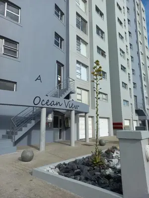 a building with a sign that reads ocean view at OCEAN VIEW, Blouberg Beach, Sunsets & Kite Beach in Bloubergstrand