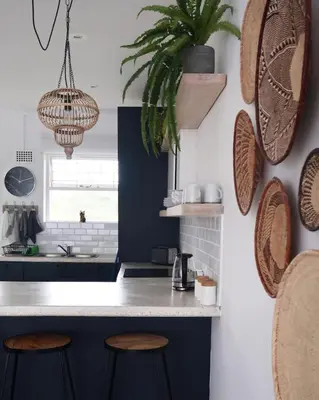 a kitchen with a blue counter and stools at Quiet hidden gem in historic Stellenbosch in Stellenbosch