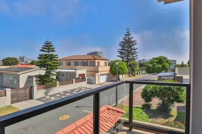 a balcony with a view of a street at Howard Davis 28B by CTHA in Cape Town
