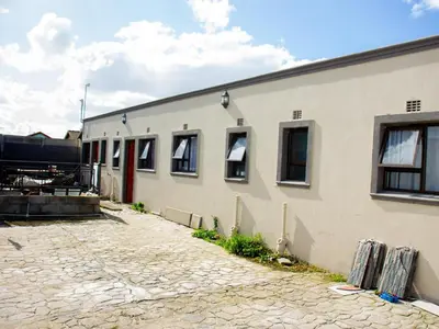 a building with windows on the side of it at Maseyi On 8 bnb in Cape Town