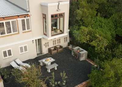 an overhead view of a patio with a fire pit at Avemore Hidden Haven - wood fired hot tub and full Backup power in Stellenbosch