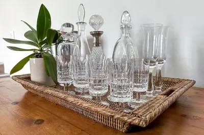 a tray with glasses and bottles on a table at Ivy House - Super Spacious Spot- Somerset West in Somerset West