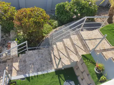an overhead view of a set of stairs in a garden at Gardenia Guesthouse in Cape Town