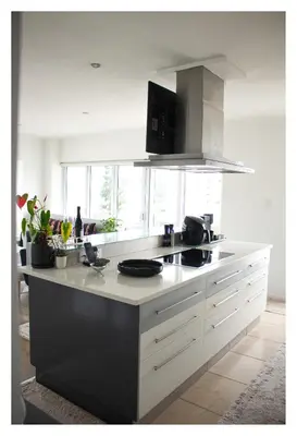 a kitchen with a black and white counter top at St Clouds Strand in Strand