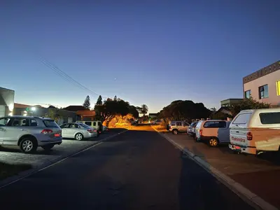 a group of cars parked in a parking lot at Coastal House - 2BR and Self catering in Cape Town