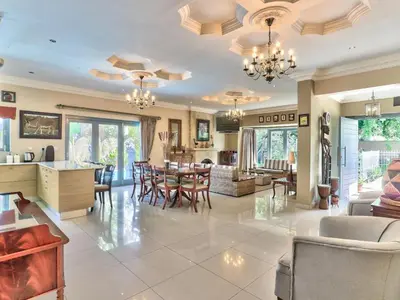 a large living room with a dining and living room at Villa Jesdene in Cape Town