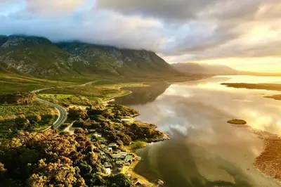 an aerial view of a river with a mountain at Great spot with a view in Hermanus , South Africa in Hermanus