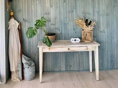 a wooden table with plants on it in a room at Great spot with a view in Hermanus , South Africa in Hermanus